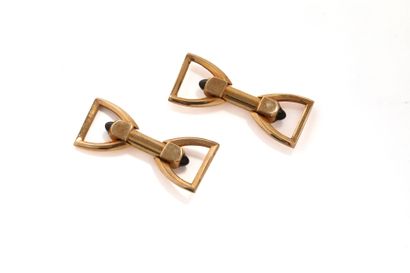 Pair of cufflinks with gilded metal stirrup...