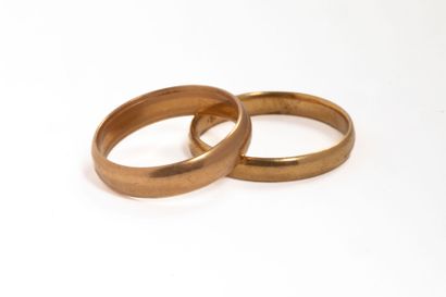 Two wedding rings in 18k yellow gold (750...