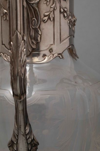 A cut-crystal ewer with silver mounting,...