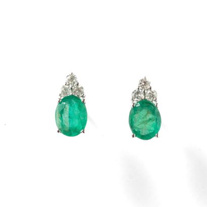 Pair of platinum ear studs adorned with two...