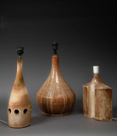 Suite of three large glazed ceramic lamps...