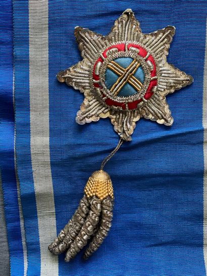 A large blue Odd Fellows ribbon harness with...