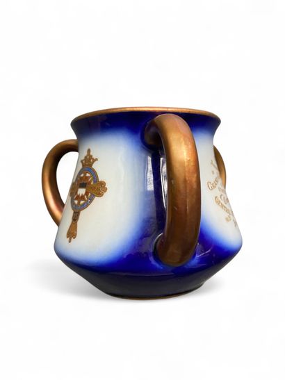 A colored earthenware coffee mug with three...