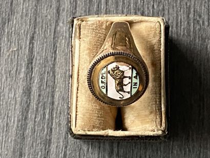 A 10 karat gold ring with enameled scene...