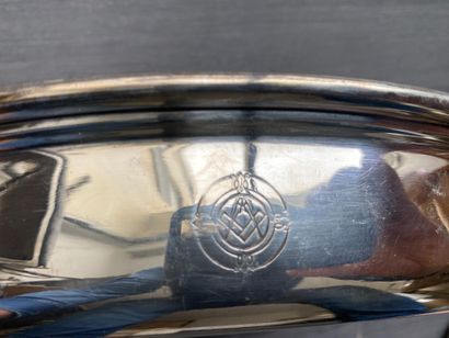 An oval silver plated dish (UK) with an engraving...