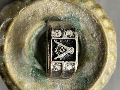 A ring with masonic motif (square & compasses...