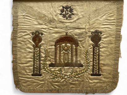 An antique French Rite apron framed in creamy...