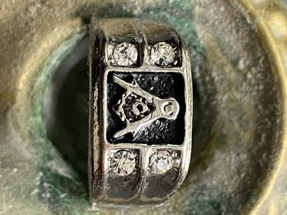A ring with masonic motif (square & compasses...