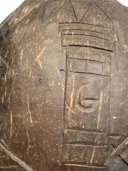 Engraved coconut-shaped flask belonging to...