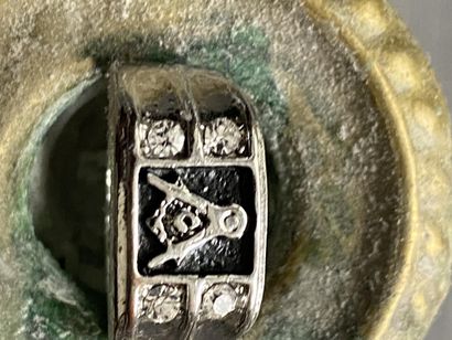 A ring with masonic motif (square & compasses...