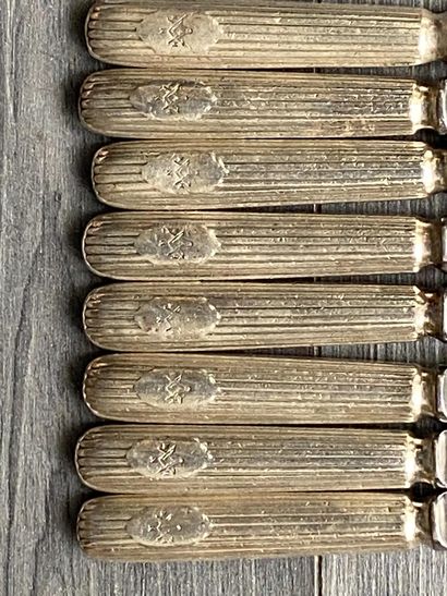 Set of eight silver-plated knives signed...
