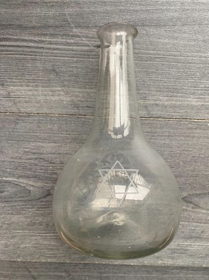 Glass caraffe with engraved Masonic symbols...
