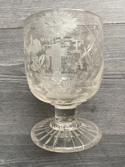 Large stemmed glass richly engraved with...