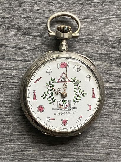 A round steel masonic pocket watch with the...
