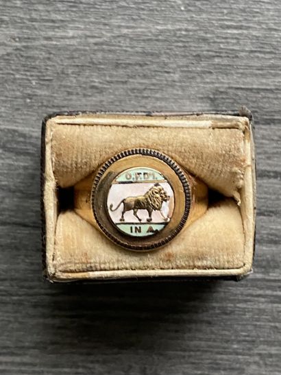 A 10 karat gold ring with enameled scene...