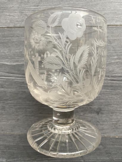 Large stemmed glass richly engraved with...