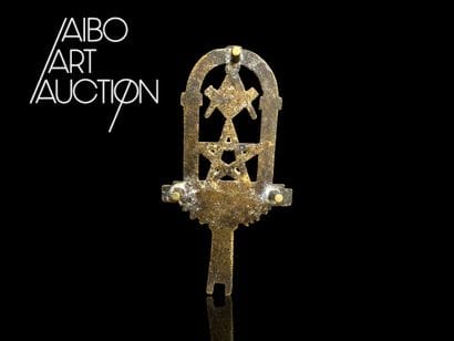 Gilded brass iron plate in the form of the...