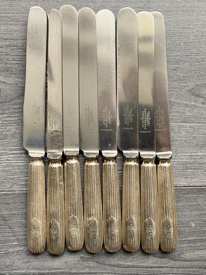 Set of eight silver-plated knives signed...