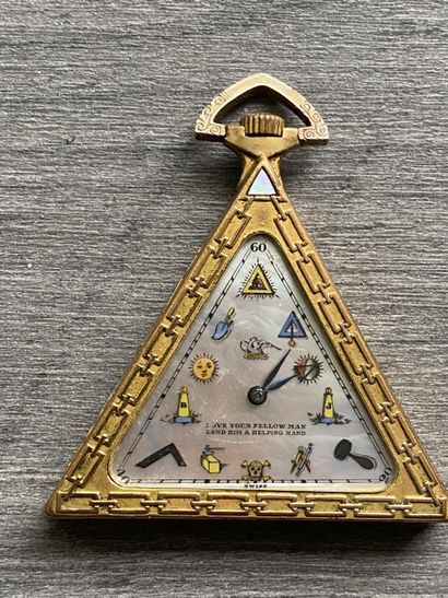 A masonic pocket watch in gilded metal, triangular...