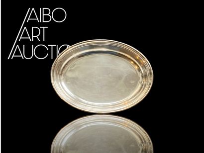 An oval silver plated dish (UK) with an engraving...