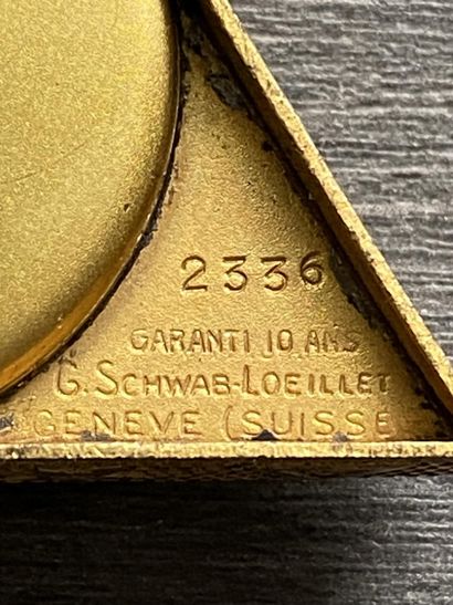 A masonic pocket watch in gilded metal, triangular...
