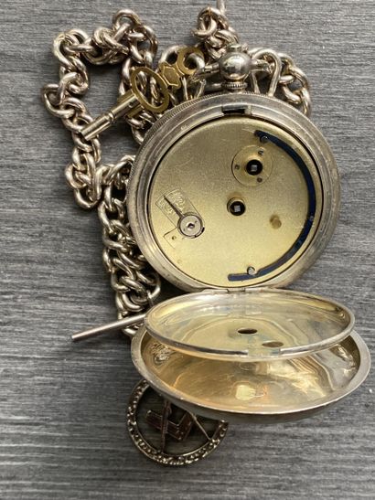 A round steel masonic pocket watch with a...