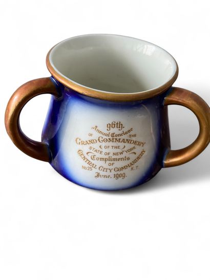 A colored earthenware coffee mug with three...
