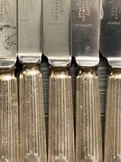 Set of eight silver-plated knives signed...