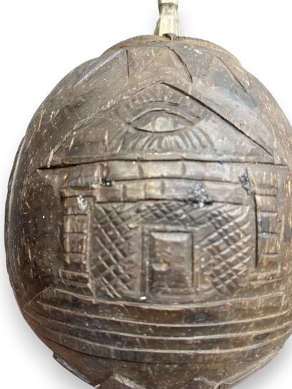 Engraved coconut-shaped flask belonging to...