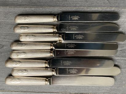 Set of eight silver-plated knives signed...