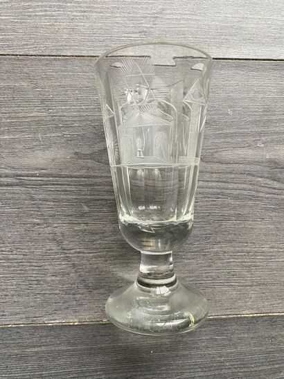 Flared stemmed glass with symbols of the...