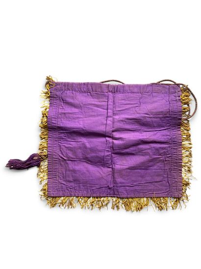 An apron in fabric (violet lisseret and yellow...