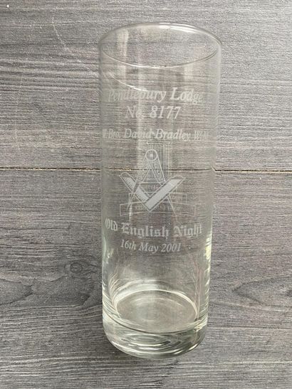 Stemmed glass with engraved symbols of the...