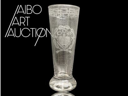 Stemmed glass with engraved symbols of the...