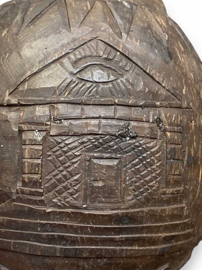 Engraved coconut-shaped flask belonging to...