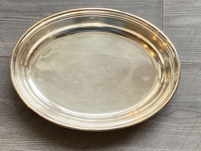 An oval silver plated dish (UK) with an engraving...