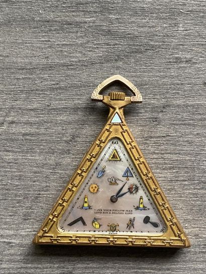 A masonic pocket watch in gilded metal, triangular...