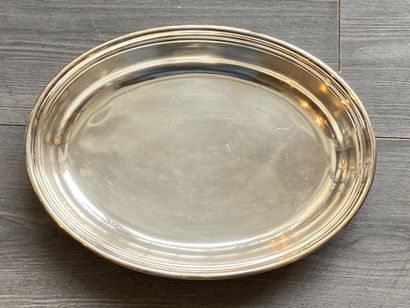 An oval silver plated dish (UK) with an engraving...