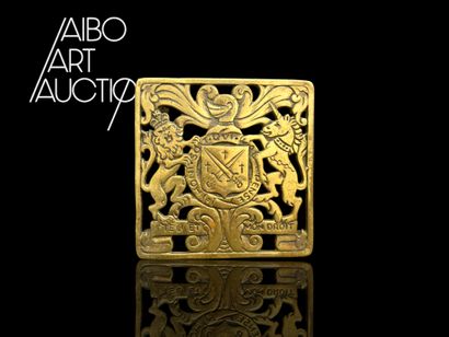 Small square-shaped gilded brass flat rest...