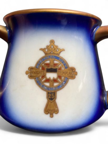 A colored earthenware coffee mug with three...