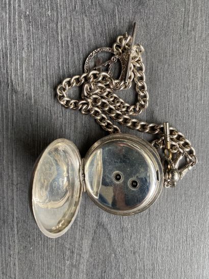 A round steel masonic pocket watch with a...