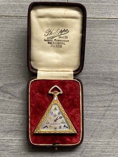 A masonic pocket watch in gilded metal, triangular...