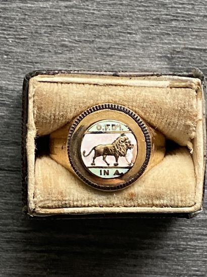 A 10 karat gold ring with enameled scene...
