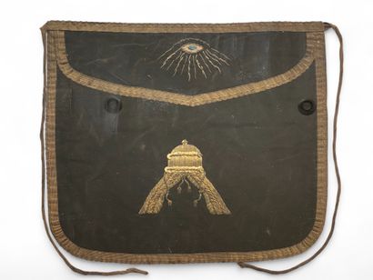 A brown framed Odd Fellows apron with gold...