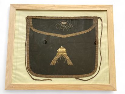 A brown framed Odd Fellows apron with gold...