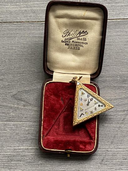 A masonic pocket watch in gilded metal, triangular...