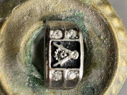 A ring with masonic motif (square & compasses...