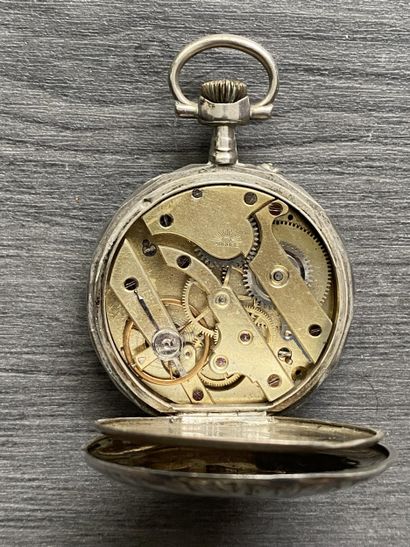 A round steel masonic pocket watch with the...