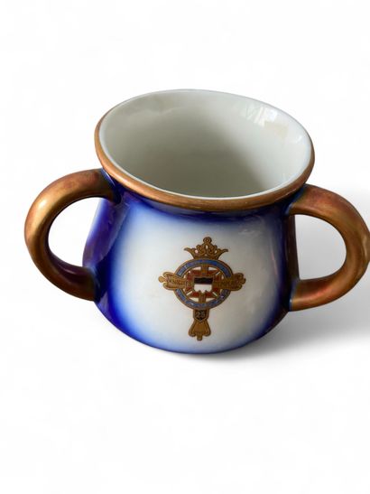 A colored earthenware coffee mug with three...