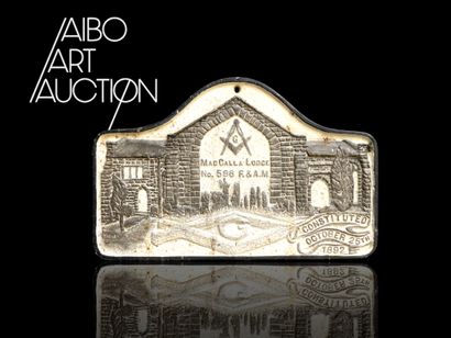 White and gray commemorative cast-iron plaque...